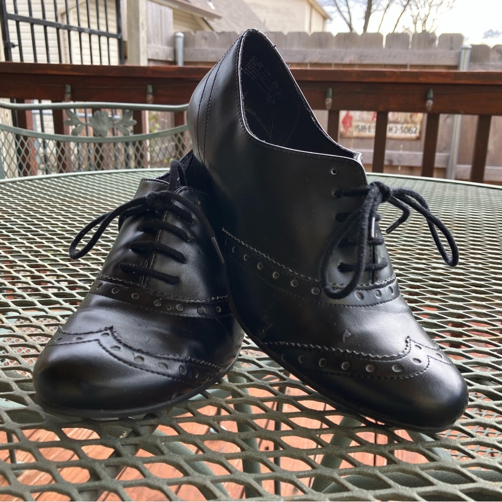 Black pair of lace up shoes Predictions brand size 7 1/2. Gently used.